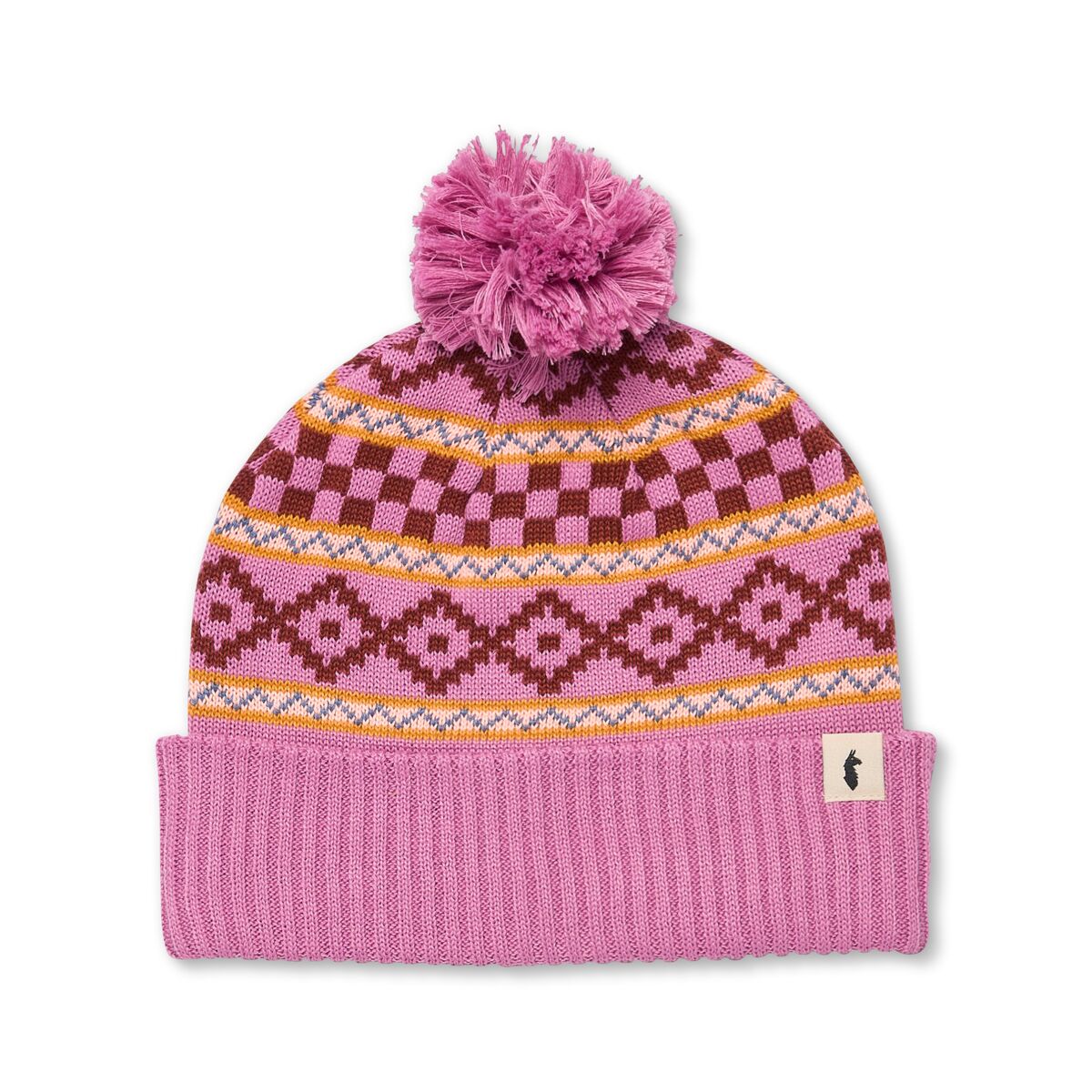 Pink knit beanie with pattern and pom-pom by Cotopaxi.