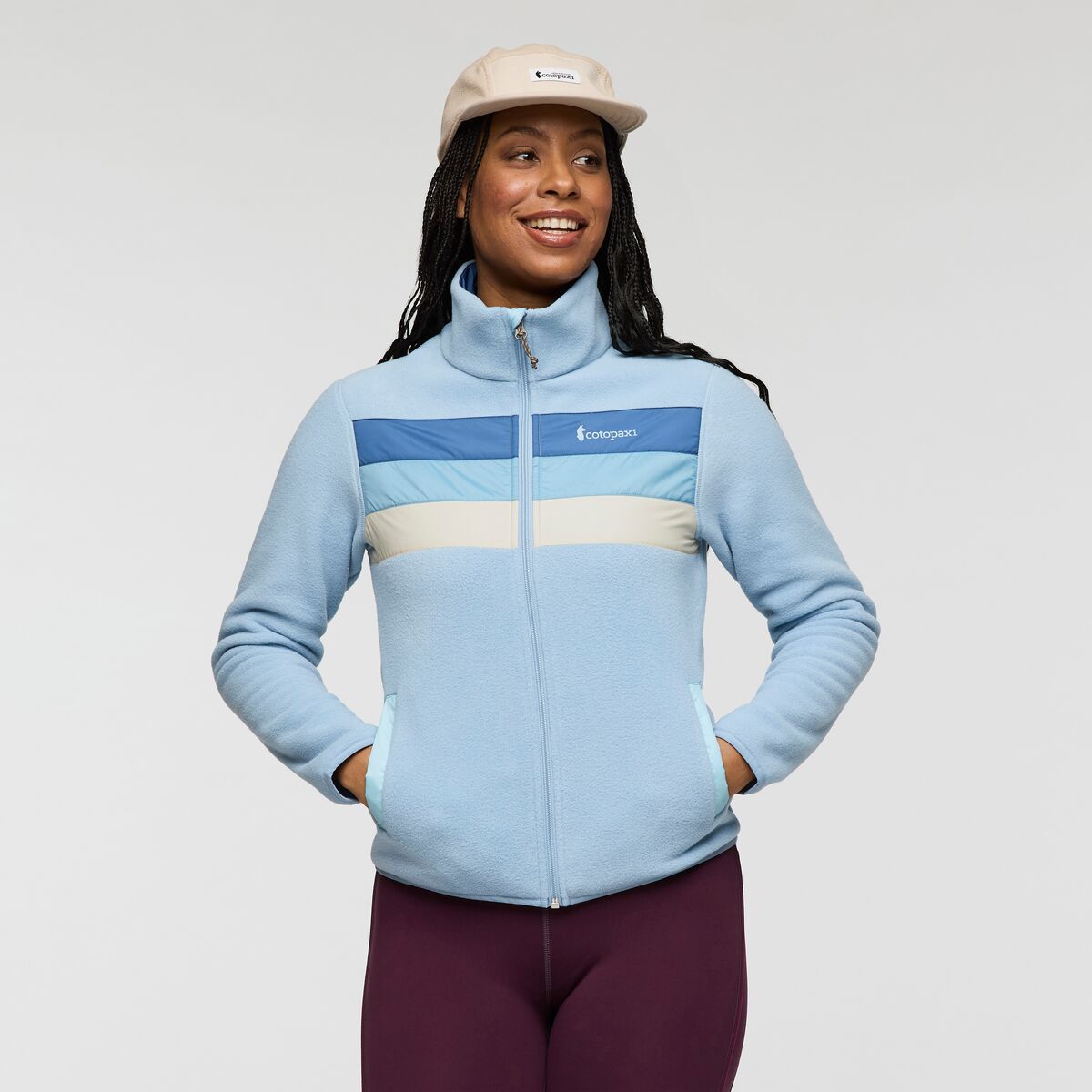 Light blue zip up fleece by Cotopaxi.