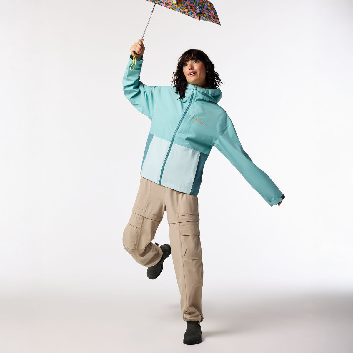 Two tone turquoise hooded raincoat by Cotopaxi.