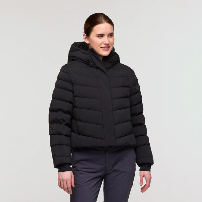Black responsibly sourced down puffer jacket by Cotopaxi.