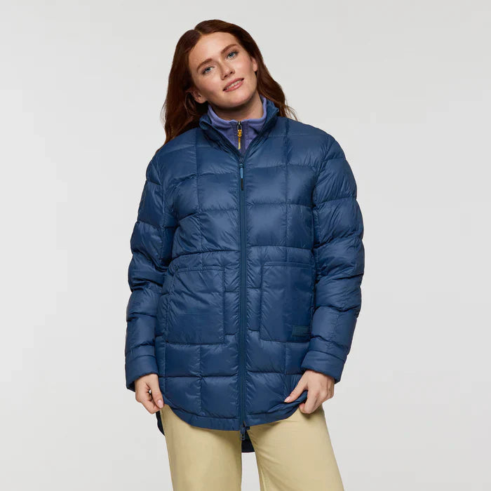Deep blue responsibly sourced down puffer jacket by Cotopaxi.