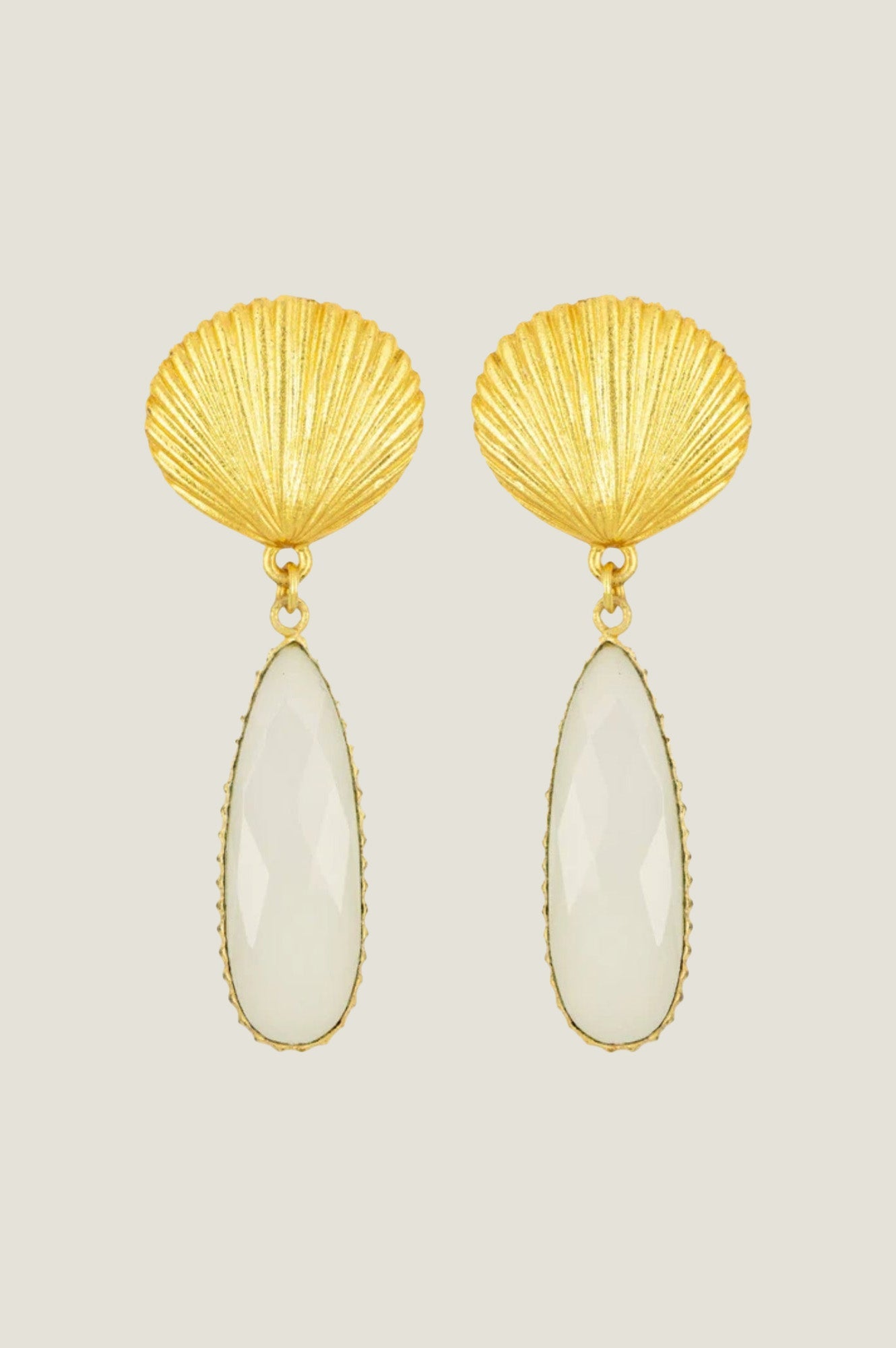 Gold shell stud drop earrings with elongated oval white stone pendants