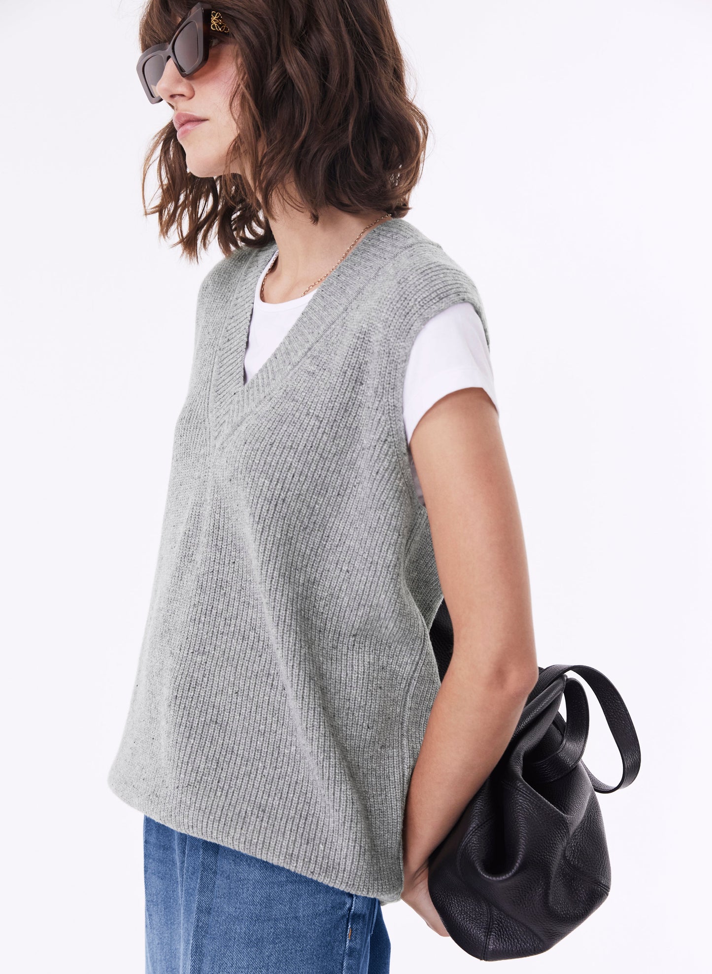 Grey sleeveless knitted tank top by Baukjen.