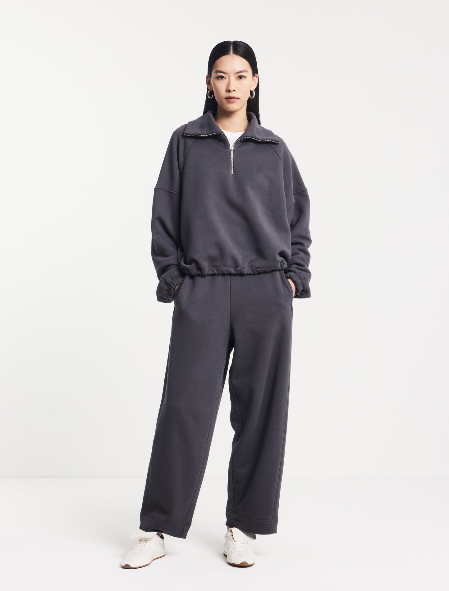 Charcoal grey jogging bottoms.