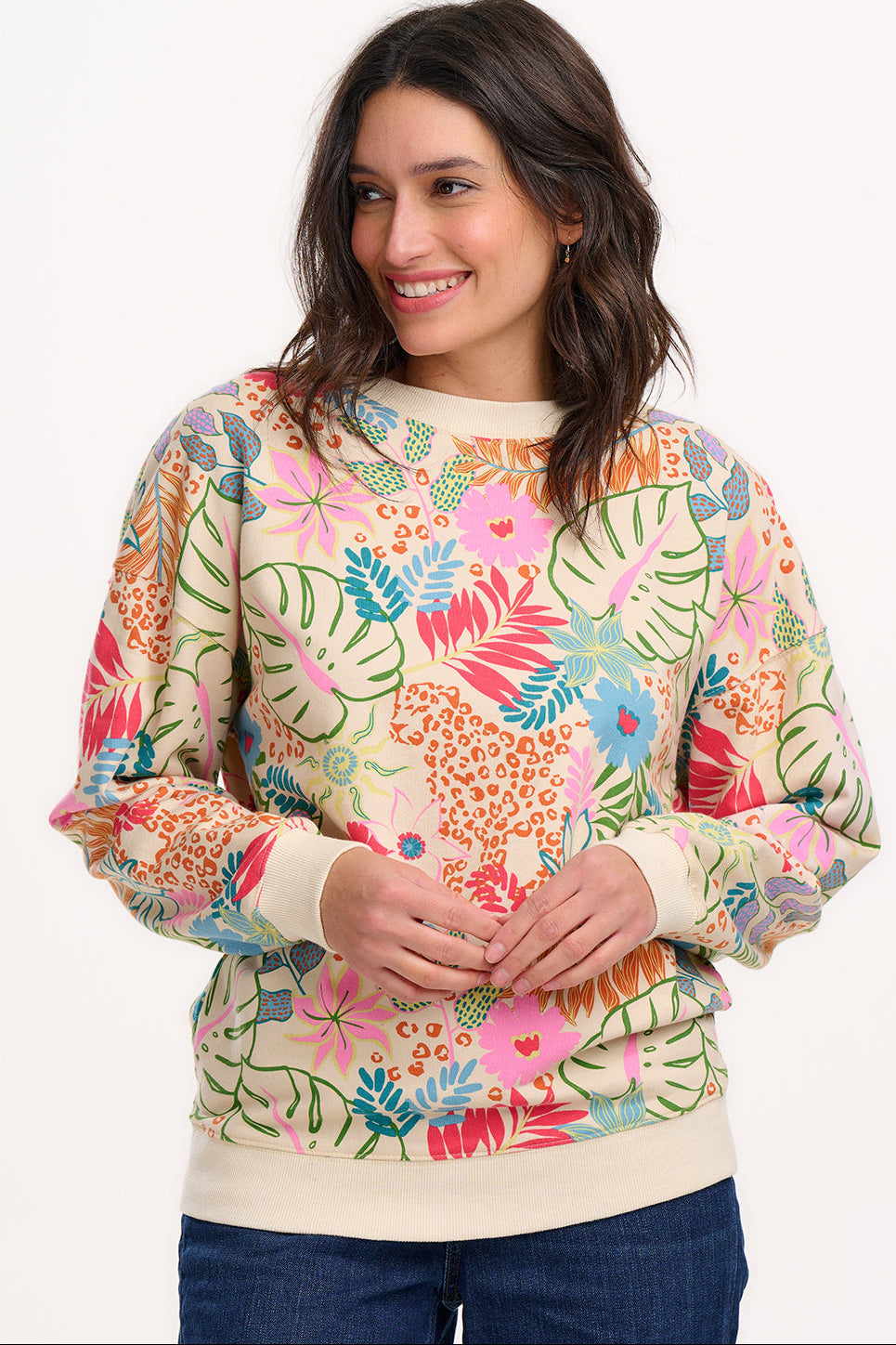 Sugarhill Brighton 100% cotton sweatshirt, with colourful pink and green tropical leaf print on a cream base.