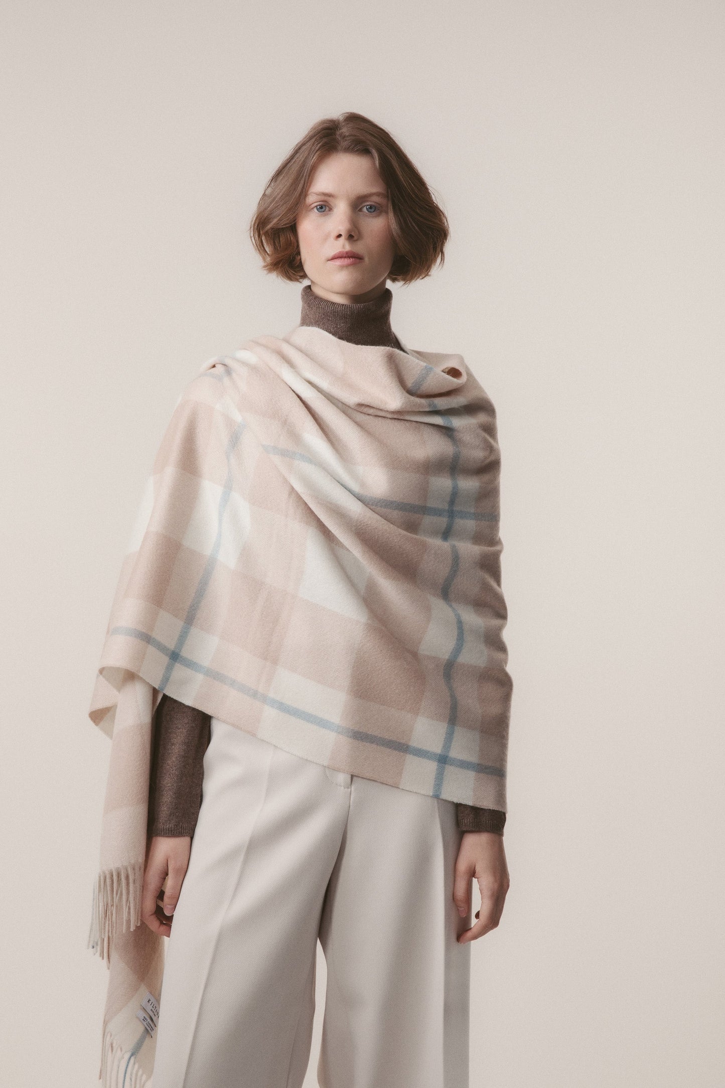 Blush pink and champagne beige checked cashmere shawl.