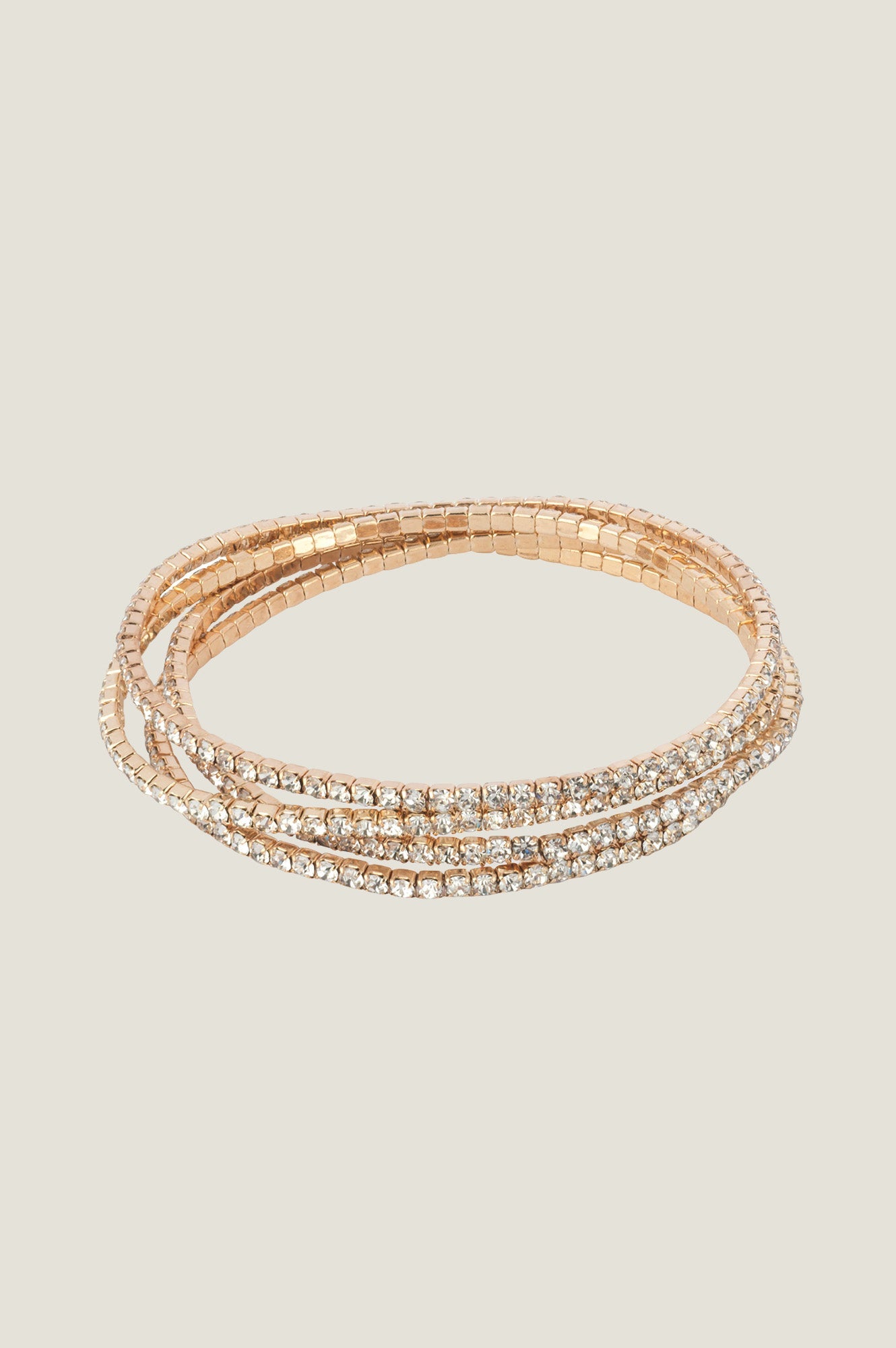 Rose gold crystal stretch bracelet with multiple rows of clear stones.