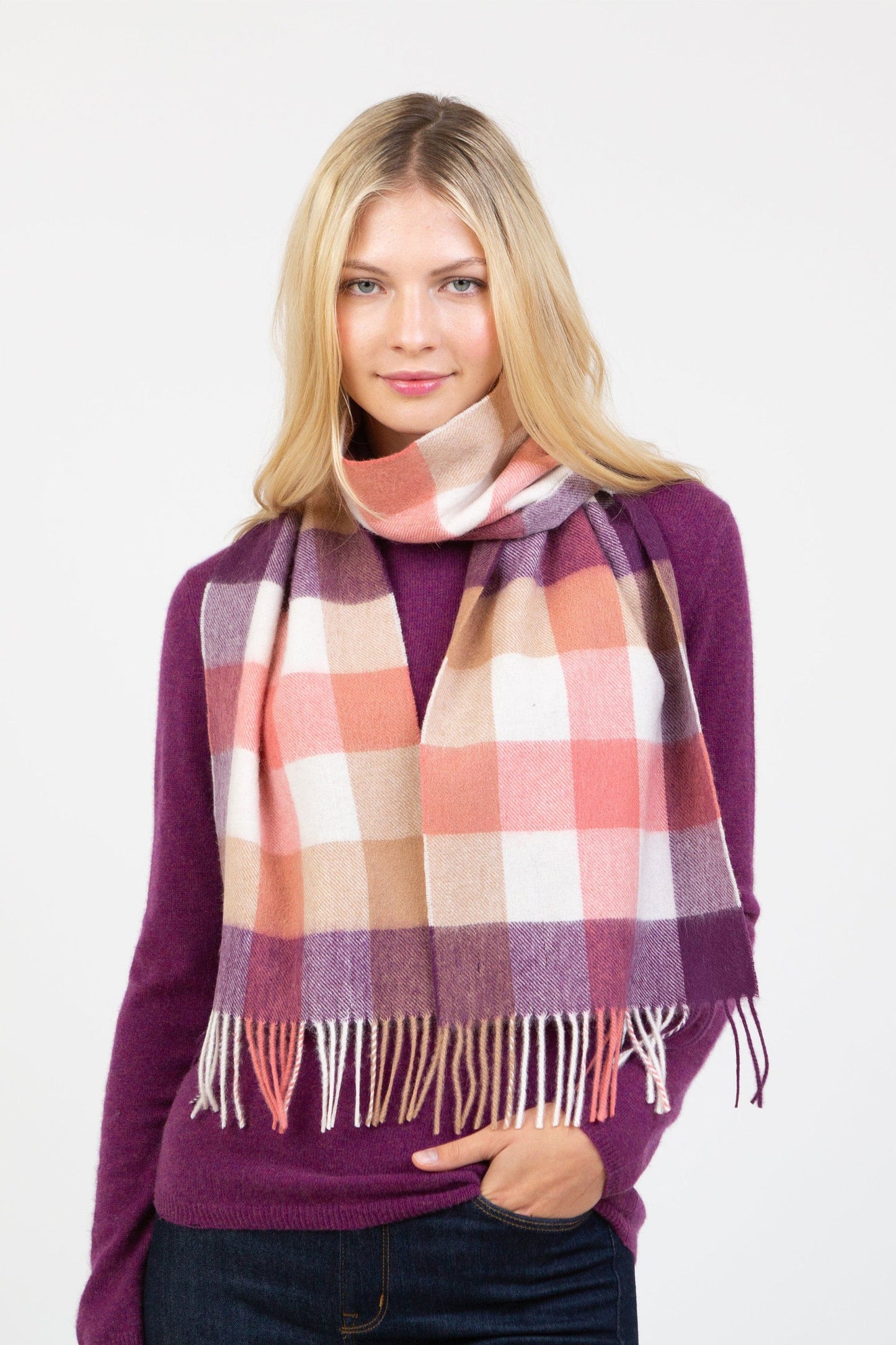 Soft coral, burgundy, and cream checked lambswool scarf by Kiltane.