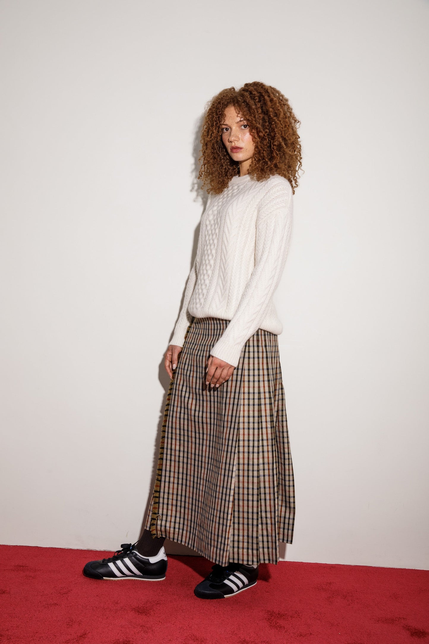 Cream cable knit crew neck sweater in 100% cashmere, from Kiltane.
