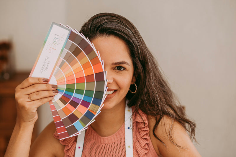 Colour analyst with Autumn swatch palette. Photo by Helena Lopes on Unsplash.   