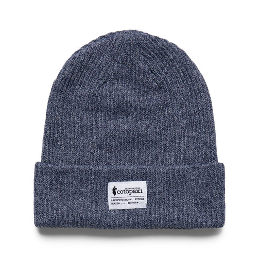 Soft charcoal grey cable knit beanie by Cotopaxi.