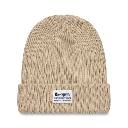 Oatmeal cable knit beanie from Cotopaxi.