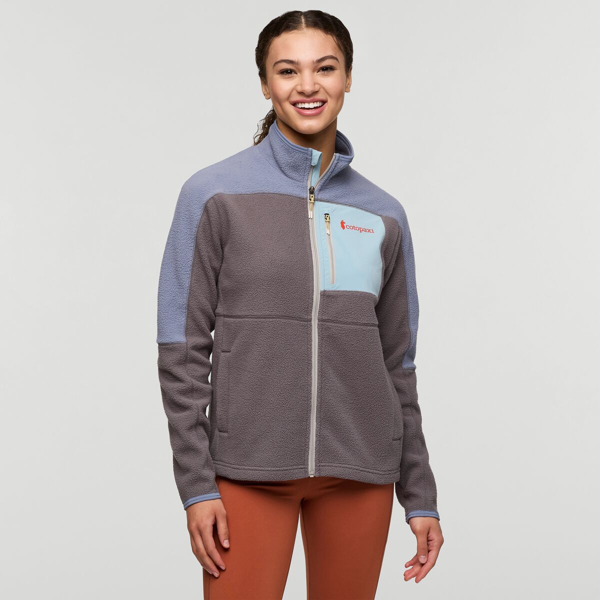 Grey and blue zipped fleece by Cotopaxi.