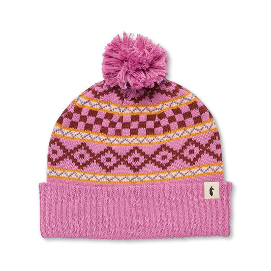 Pink knit beanie with pattern and pom-pom by Cotopaxi.