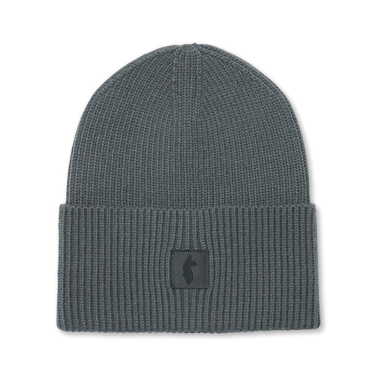 Charcoal knitted beanie by Cotopaxi with llama patch.