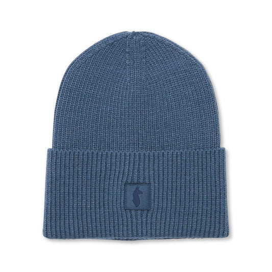 Blue knitted beanie from Cotopaxi.