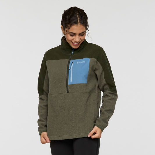 Deep moss green half zip fleece with blue pocket, by Cotopaxi.
