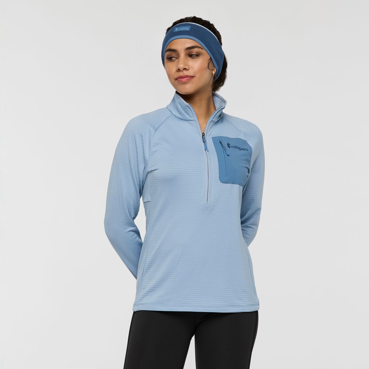 Ice blue half zip fleece by Cotopaxi.