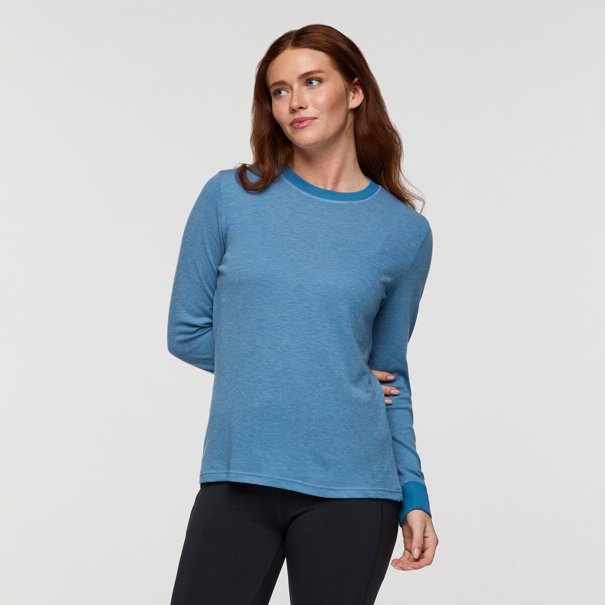 Recycled polyester and wool blend long sleeved blue top by Cotopaxi.