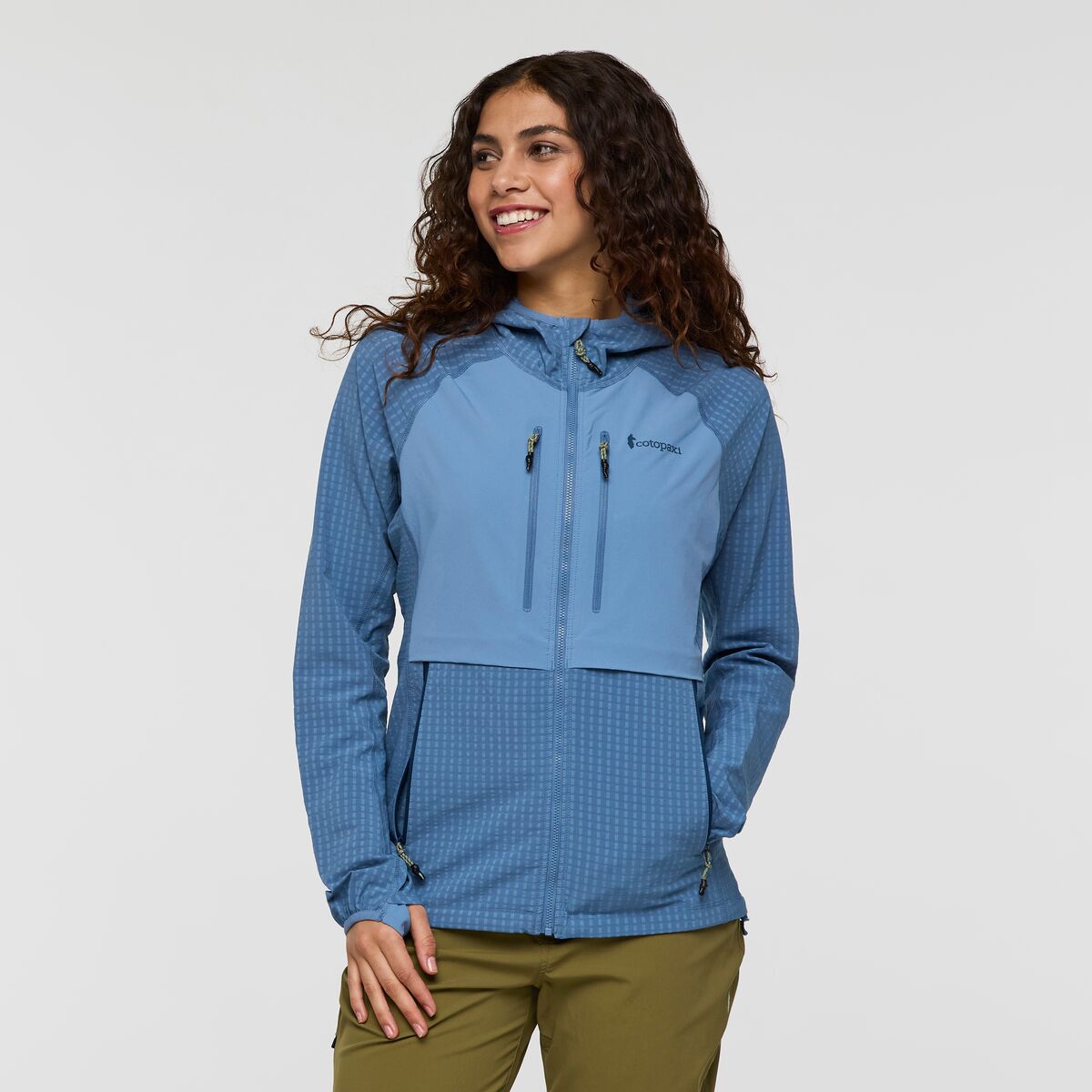 Blue waterproof hooded jacket from Cotopaxi.