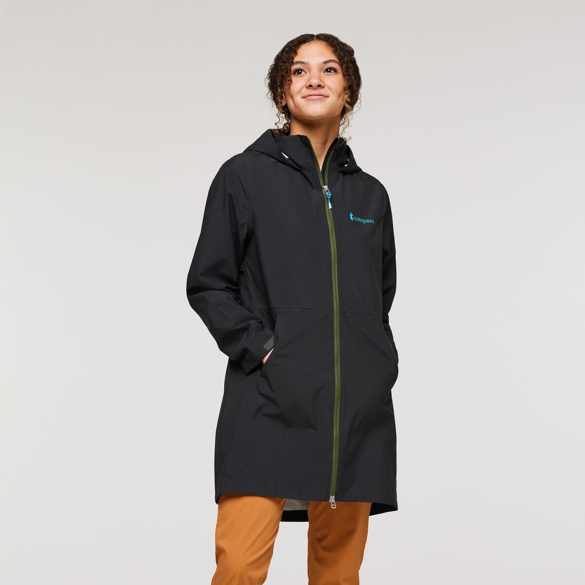 Black trench raincoat by Cotopaxi.