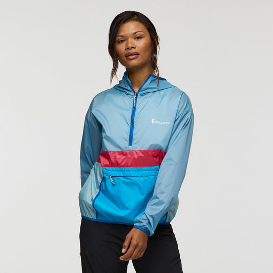 Clear blue and red half zip windbreaker with large pocket, from Cotopaxi.