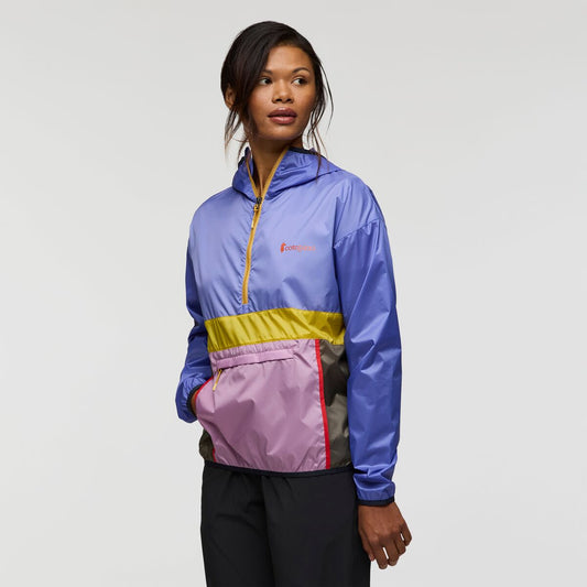 Purple and blue half zip windbreaker with lilac pocket and yellow stripe detailing, by Cotopaxi.