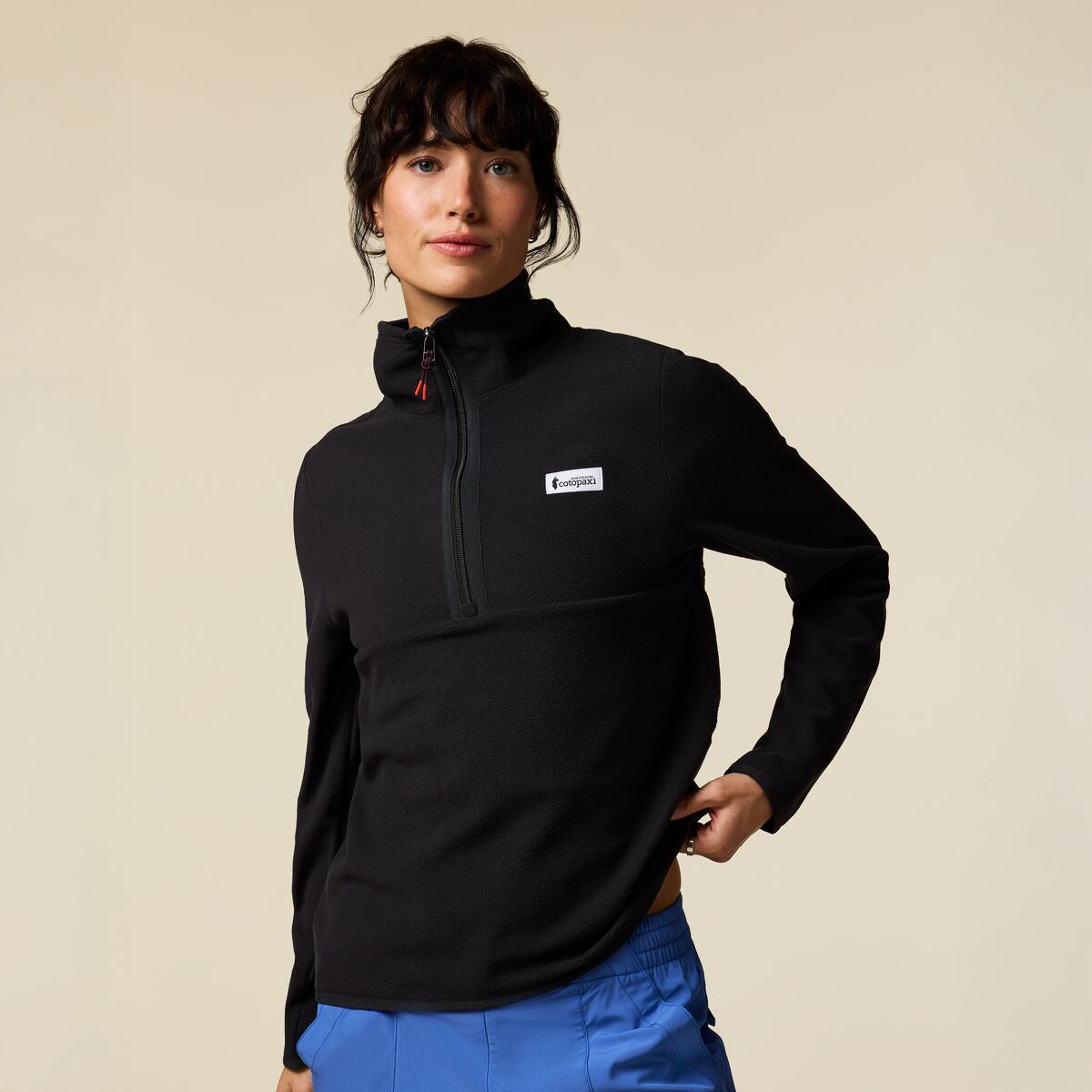 Black half zip recycled fleece by Cotopaxi.