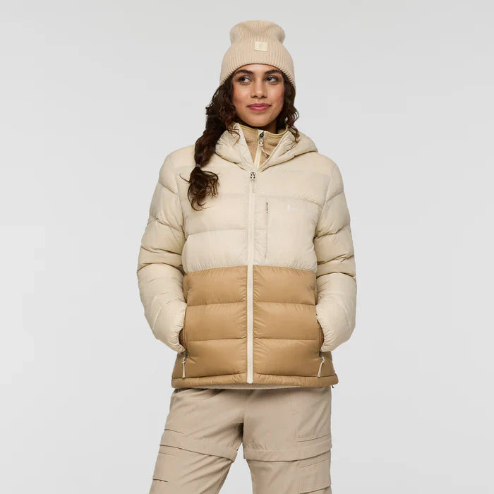 Two-tone cream and beige responsibly sourced down puffer jacket with hood, by Cotopaxi.