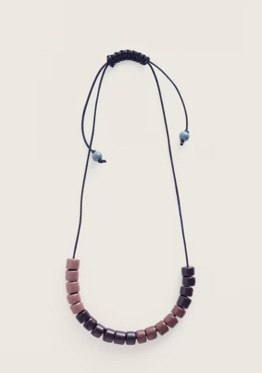 Purple ceramic beaded necklace.
