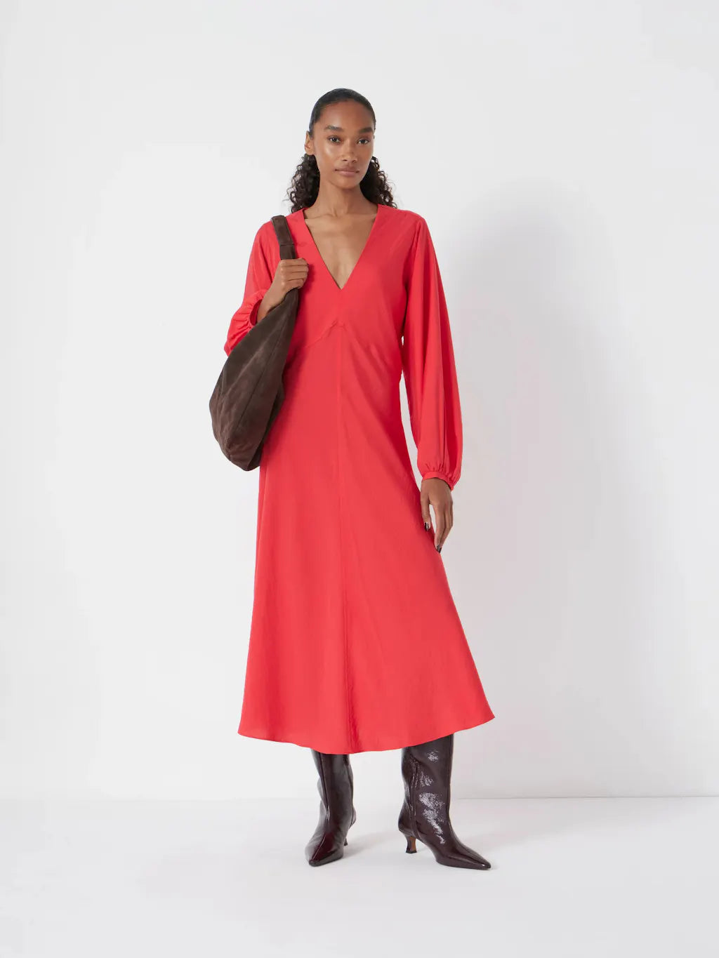 Red midi dress with long sleeves.