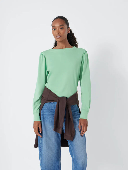 Cotton puff sleeve top in mint green.