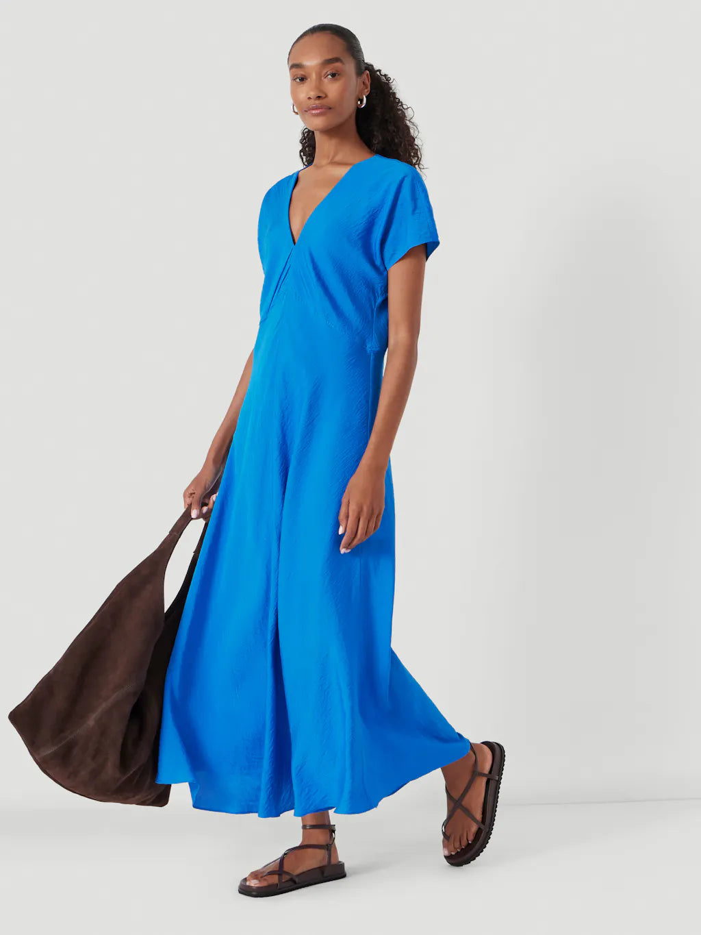 Bright blue v neck dress.