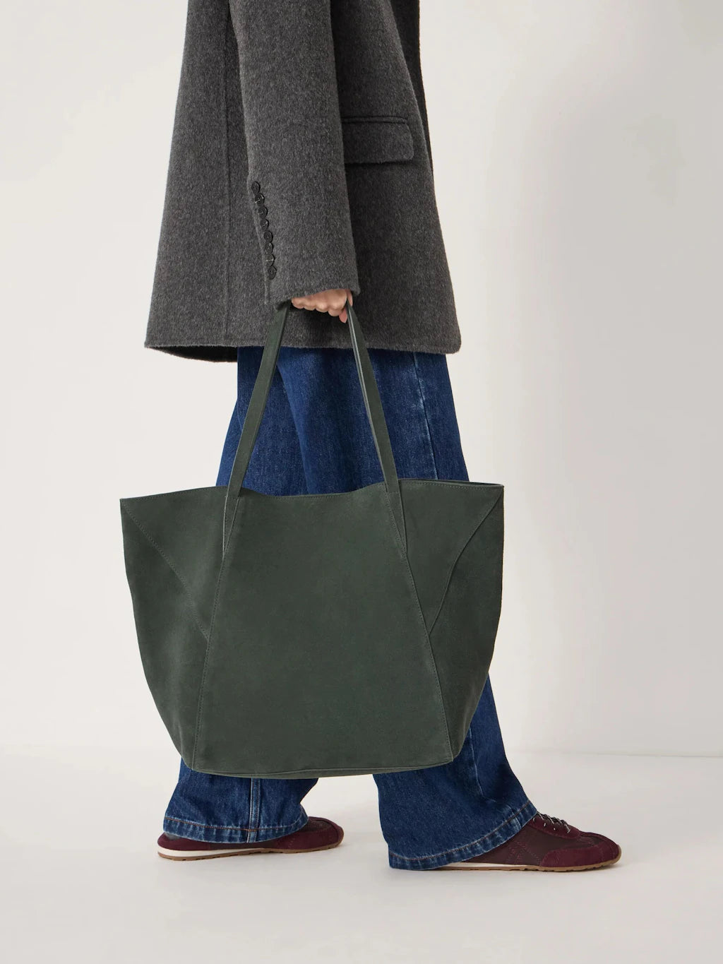 Teal suede panel tote bag.