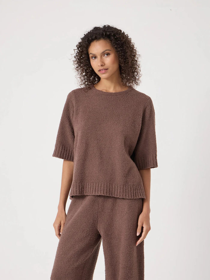 Warm brown boucle knit short-sleeve top.