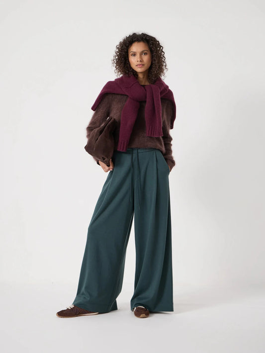 Deep, cool teal wide leg trousers.
