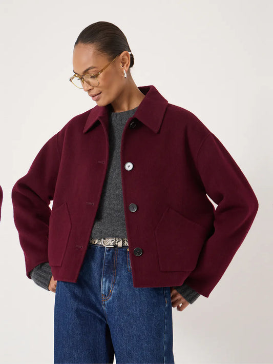 Wine red wool jacket with deep pockets.