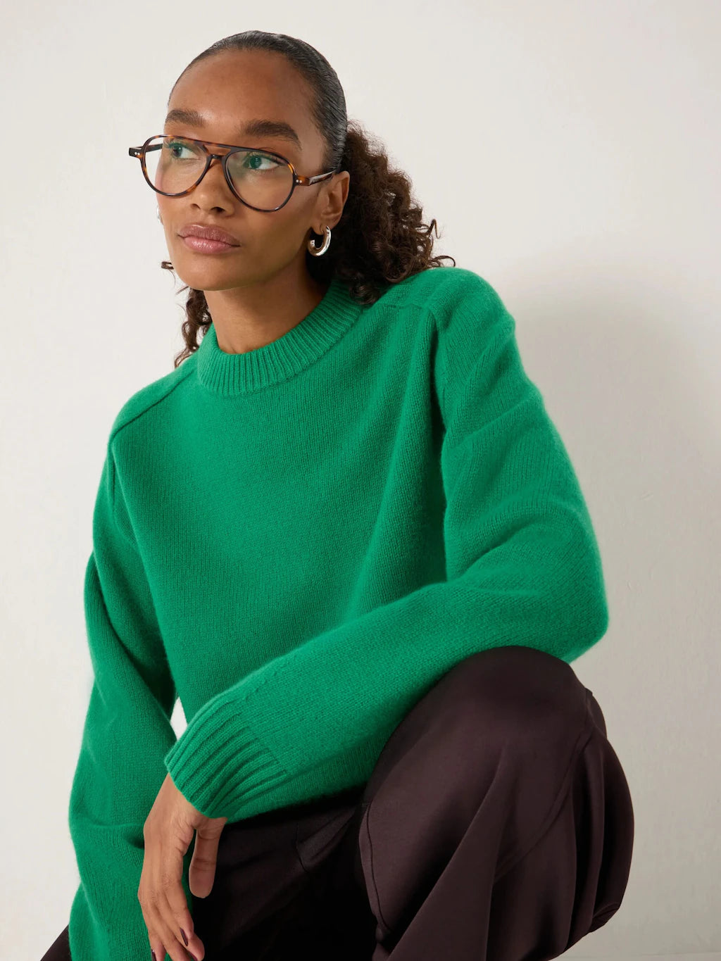 Bright green merino wool jumper.
