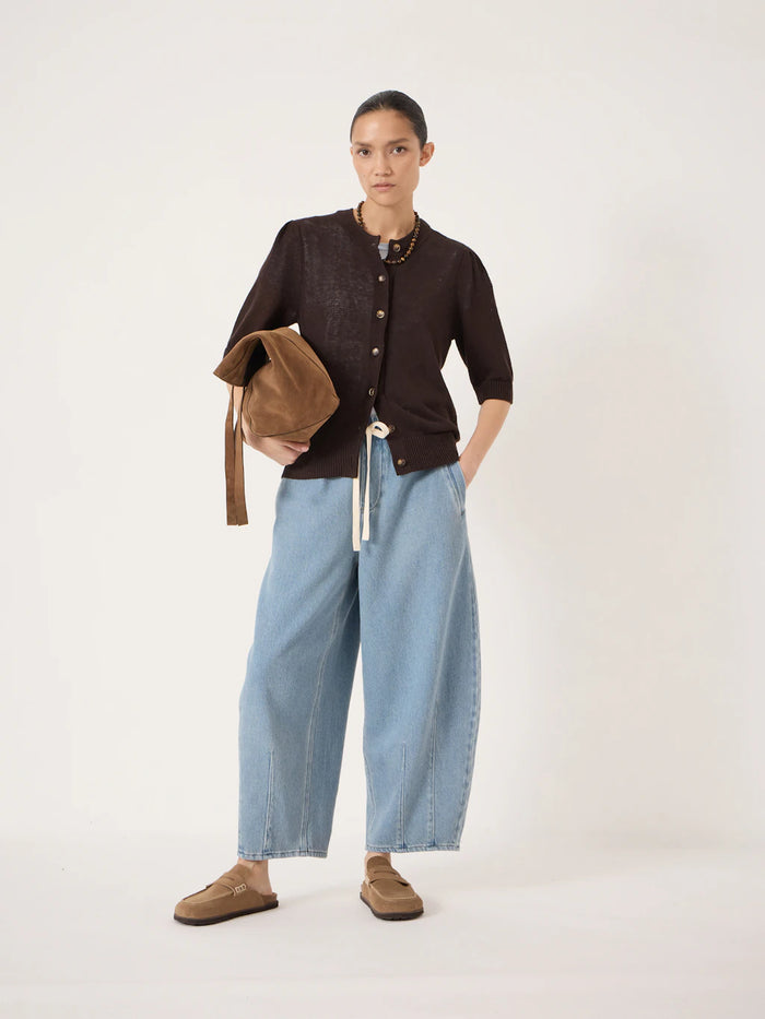 Dark brown cardigan with three quarter sleeves and brass buttons.