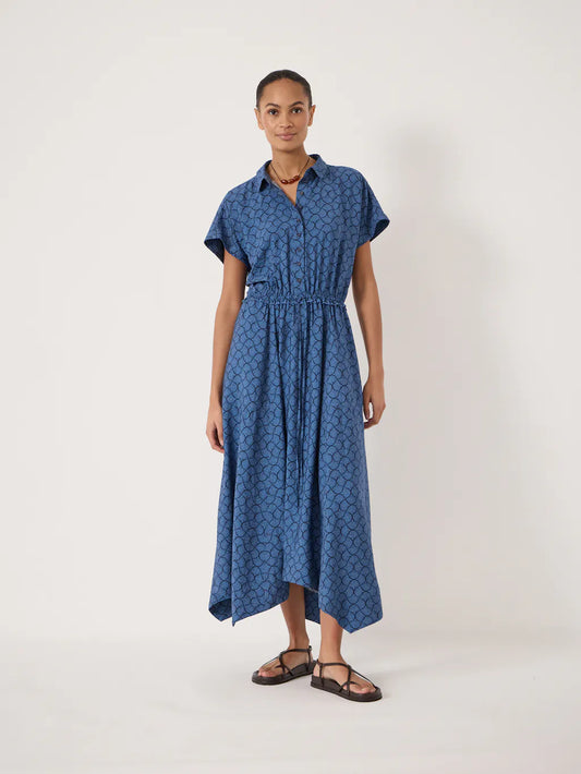 Seashell pattern blue dress with collar and handkerchief hem.