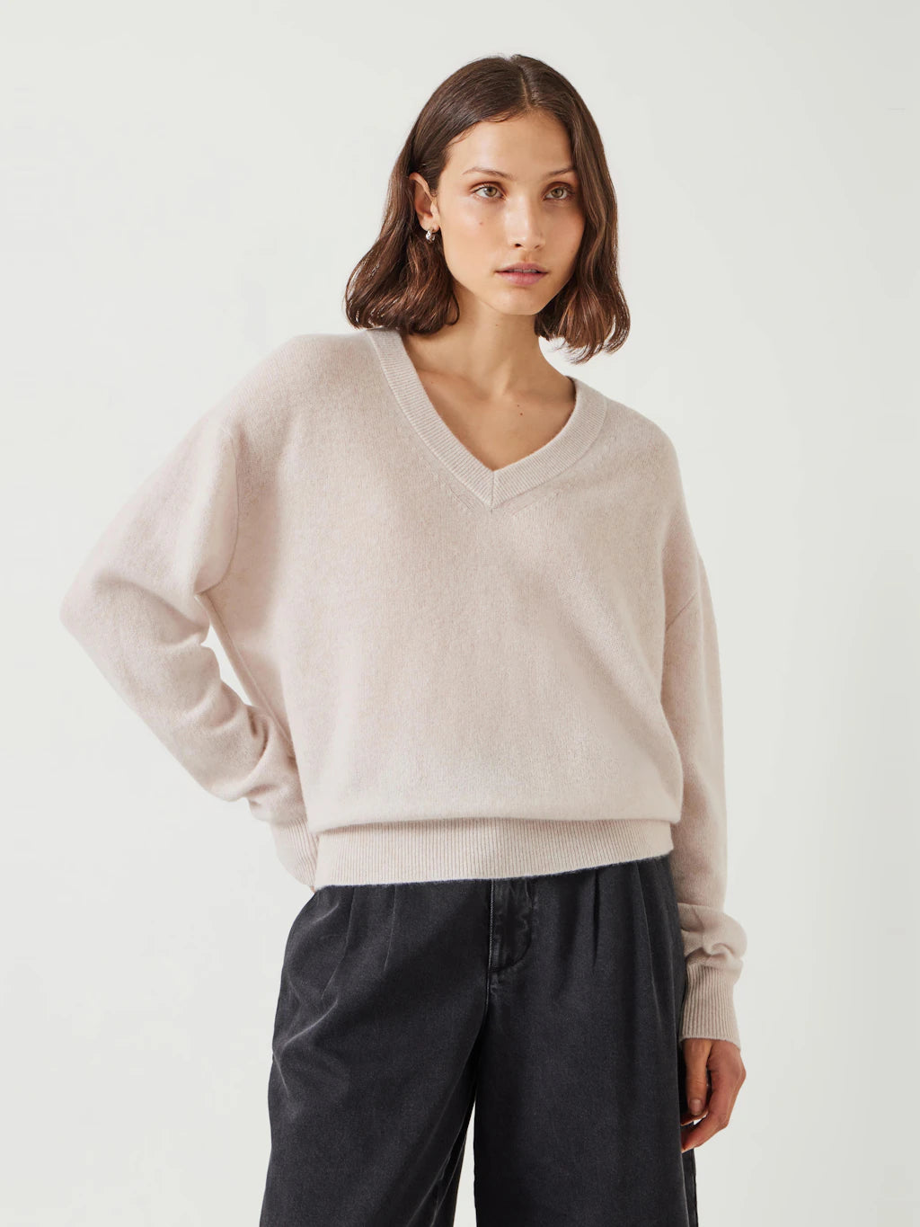 Neutral stone coloured cashmere jumper.