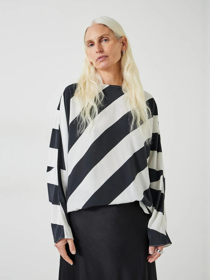 Geometric navy and white striped top.