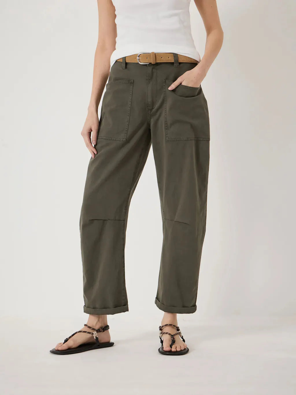Cotton khaki barrel leg trousers.