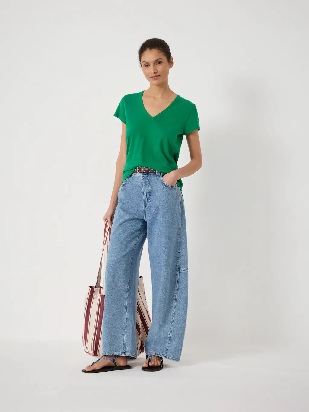 Bright green 100% cotton V-neck T-shirt in a soft jersey fabric with short sleeves and a relaxed fit.