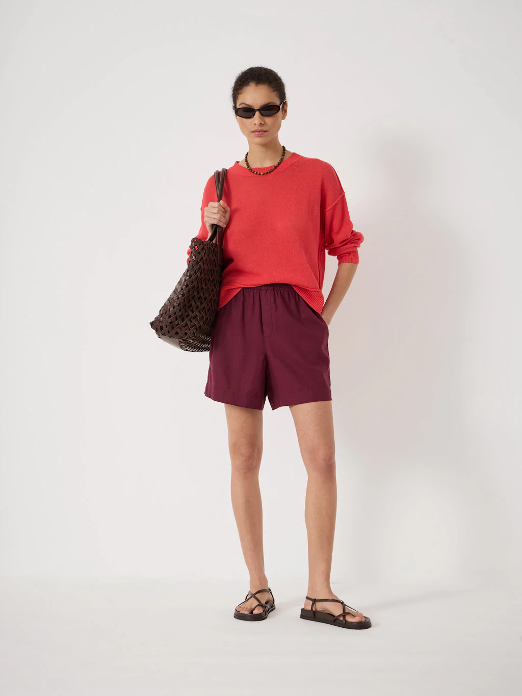 Maroon red linen shorts.