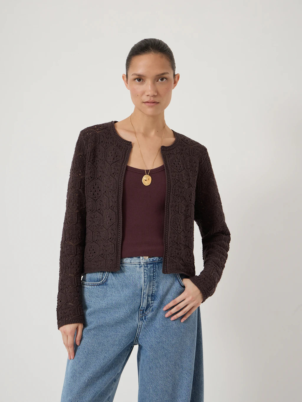Dark brown crochet cardigan.