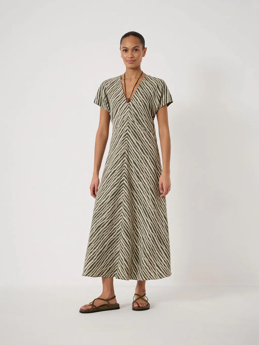 Linen v-neck dress with blurred green line pattern.