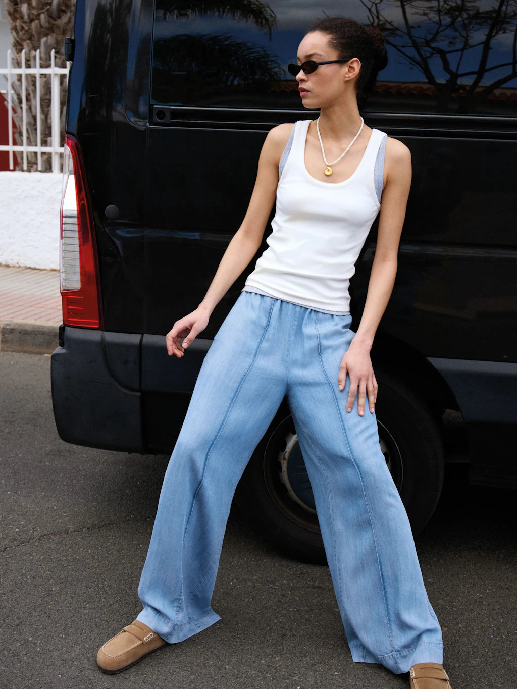 Light blue chambray wide leg trousers.