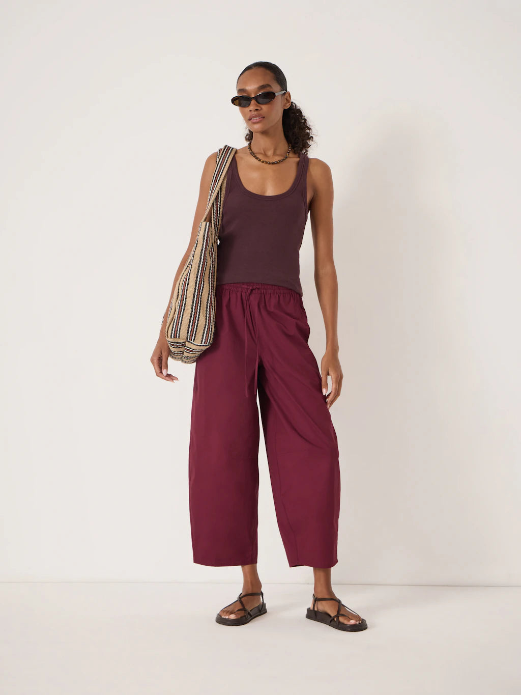 Organic cotton wide leg maroon red trousers.