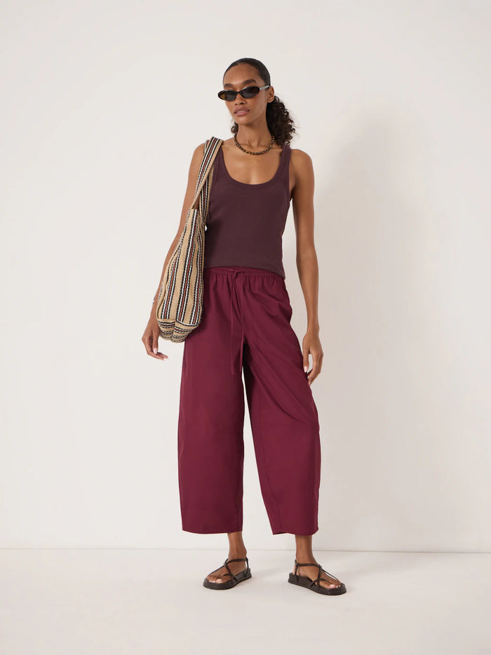 Organic cotton wide leg maroon red trousers.